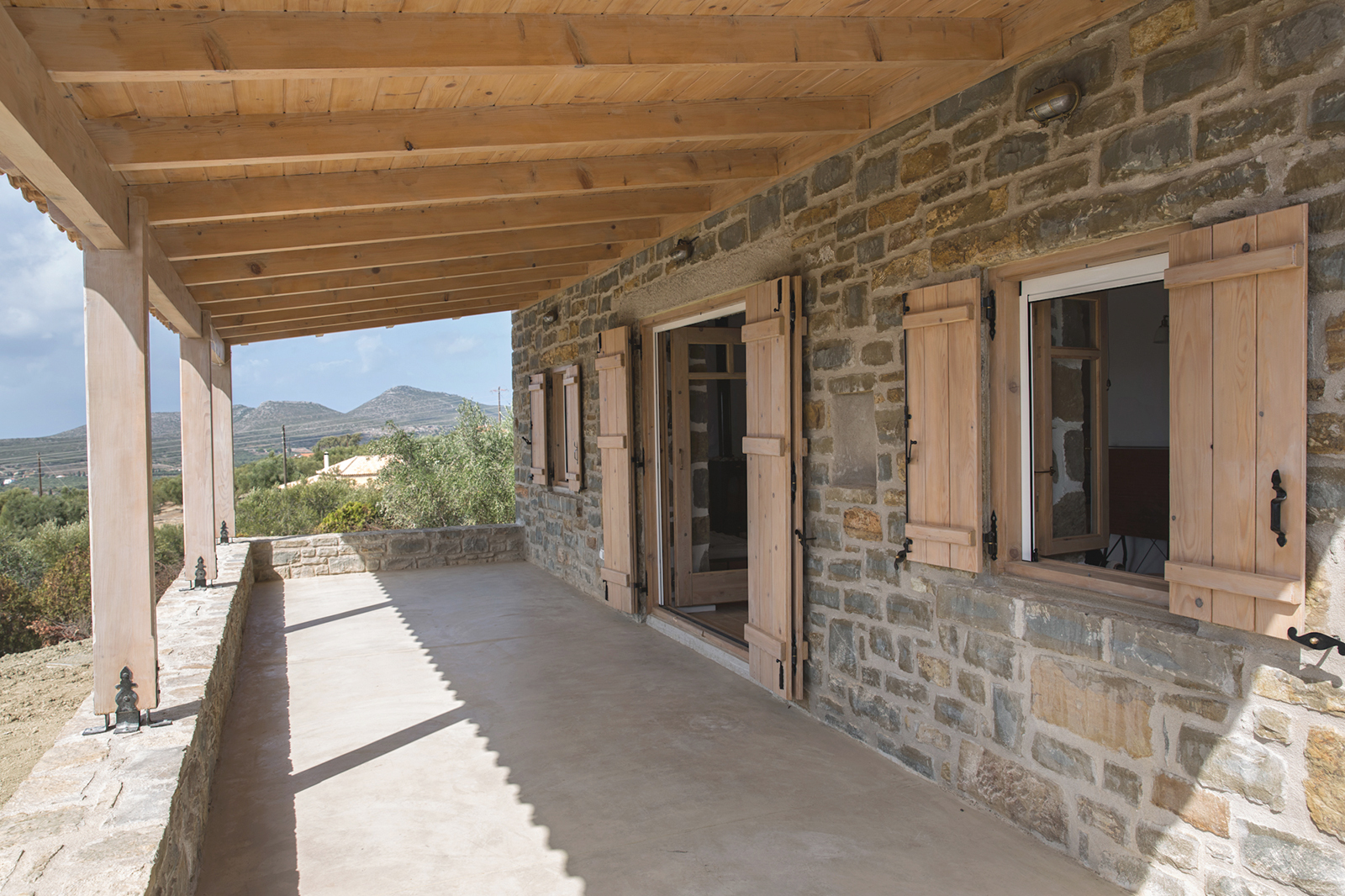 Archisearch Chrysanthé Kastani designs Two Stone Cottages in Messinia.