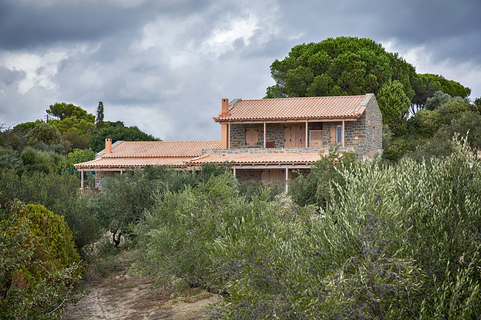 Archisearch Chrysanthé Kastani designs Two Stone Cottages in Messinia.