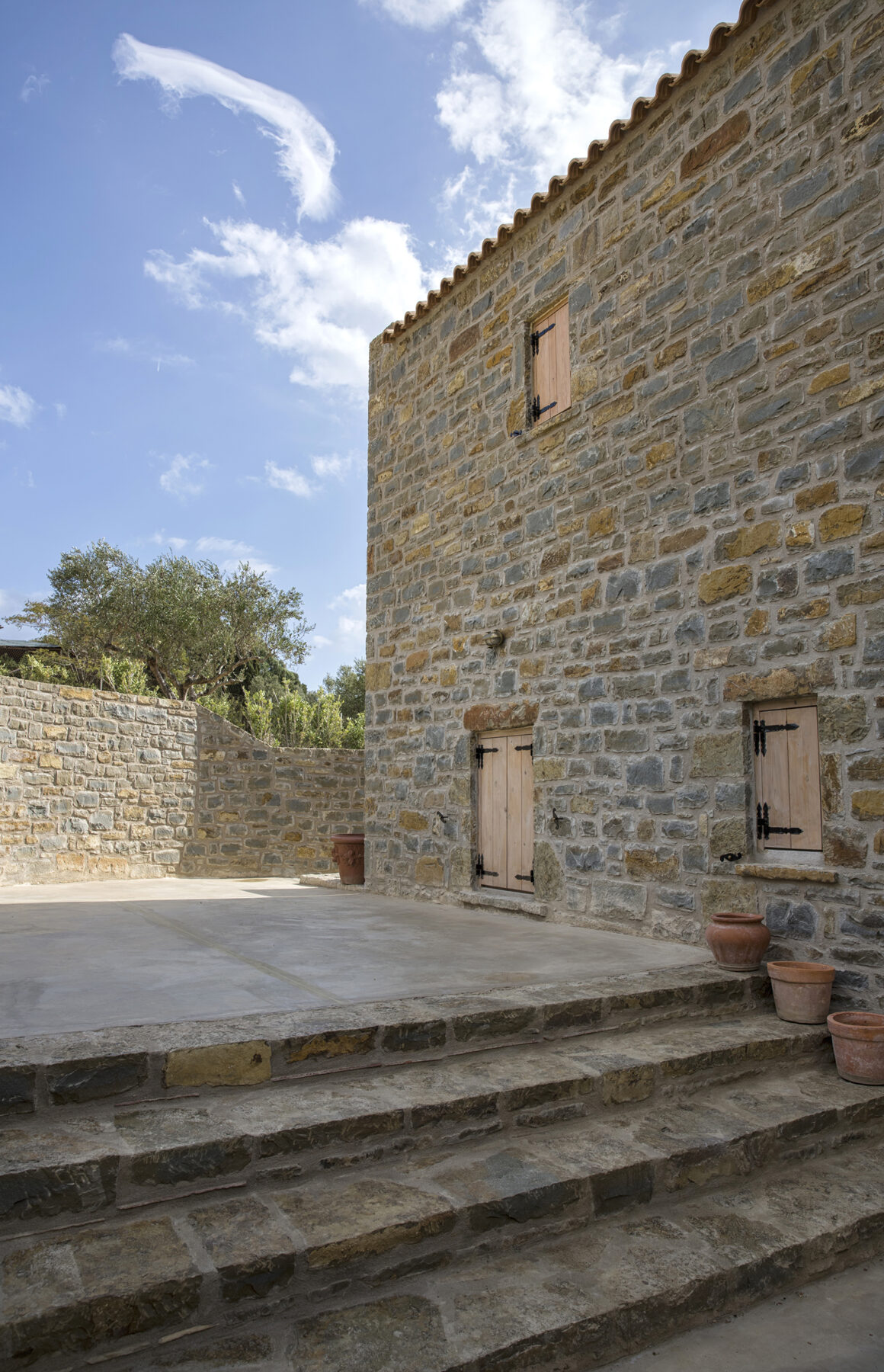 Archisearch Chrysanthé Kastani designs Two Stone Cottages in Messinia.