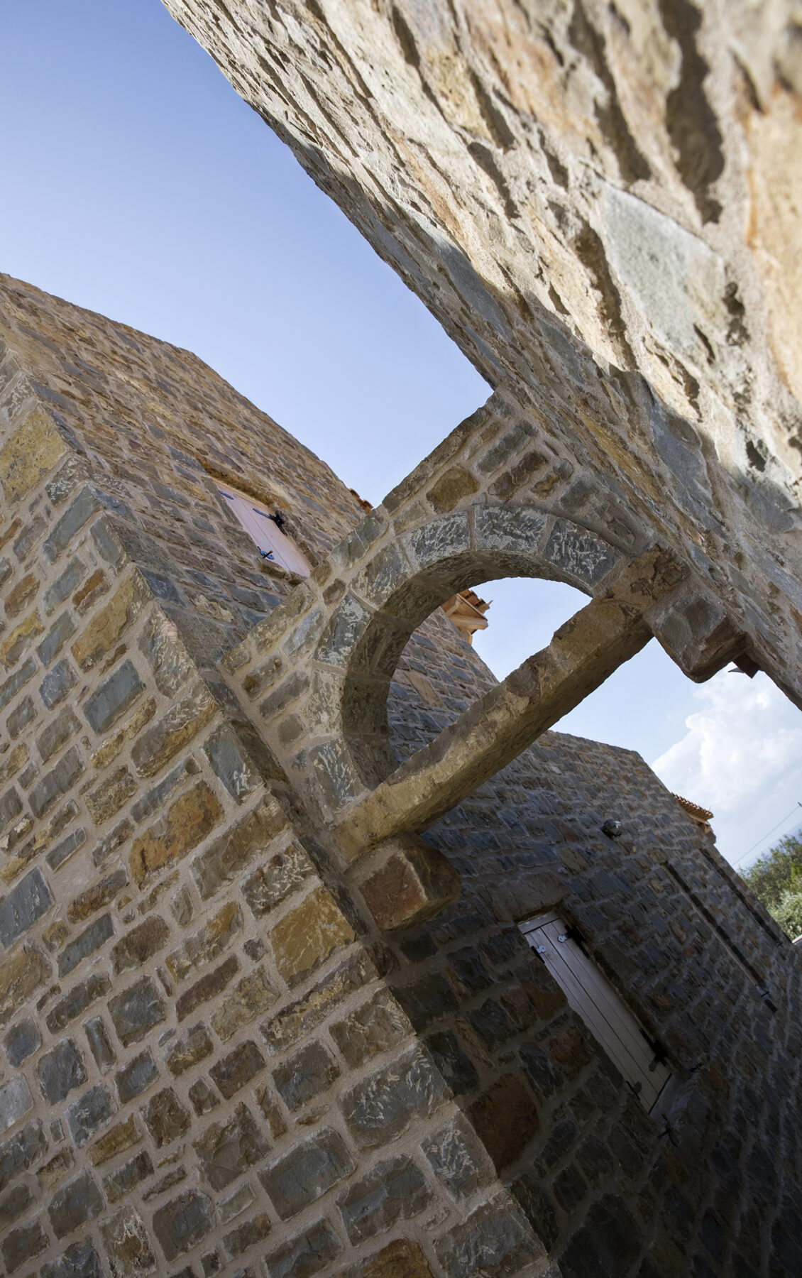 Archisearch Chrysanthé Kastani designs Two Stone Cottages in Messinia.