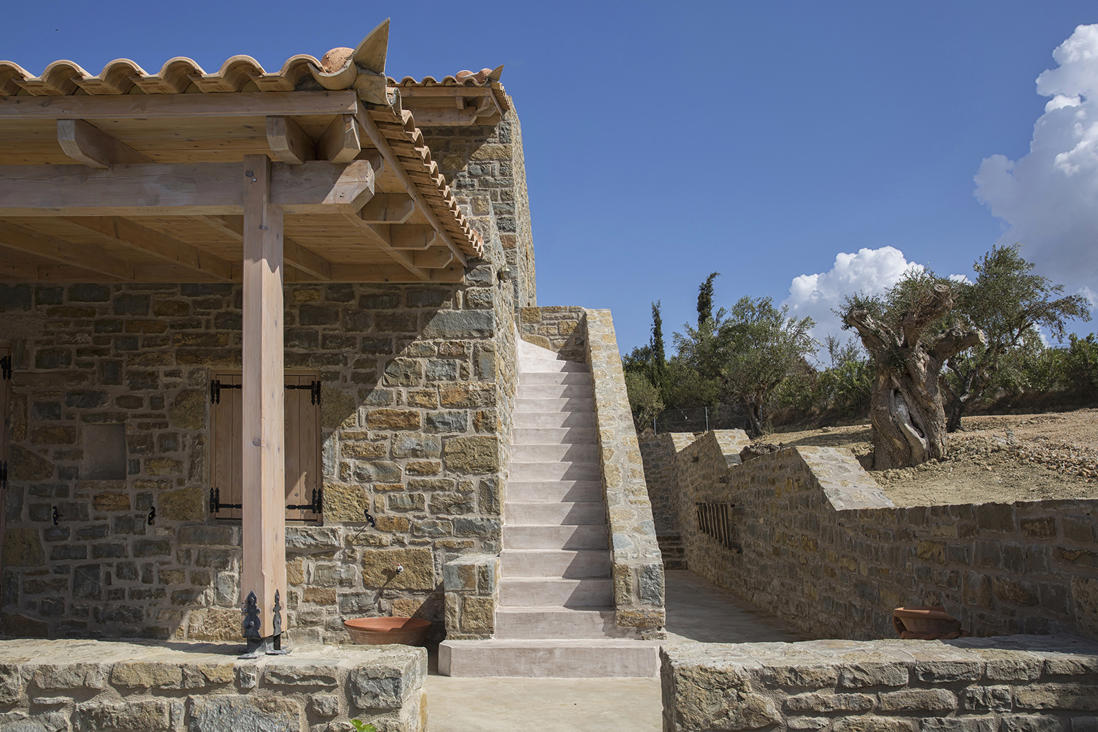 Archisearch Chrysanthé Kastani designs Two Stone Cottages in Messinia.