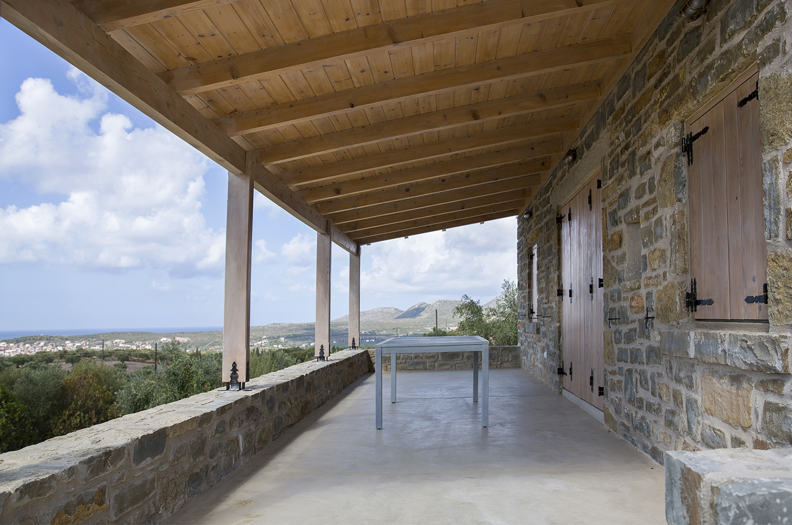 Archisearch Chrysanthé Kastani designs Two Stone Cottages in Messinia.