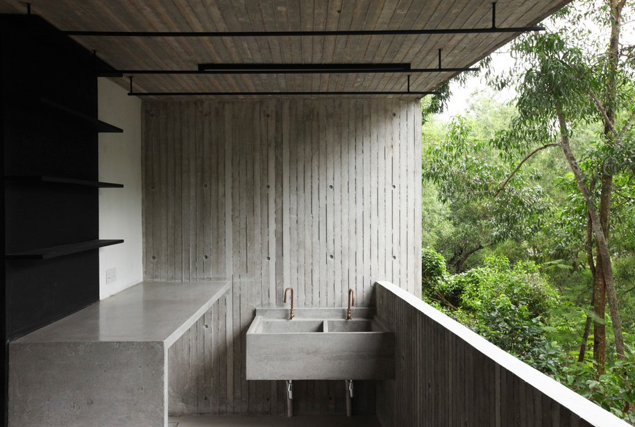 Archisearch WHBC Architects designed a concrete tropical box that embraces the lush jungle in Malaysia