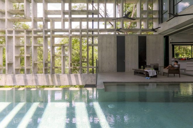 Archisearch - WHBC Architects designed a concrete tropical box that embraces the lush jungle in Malaysia